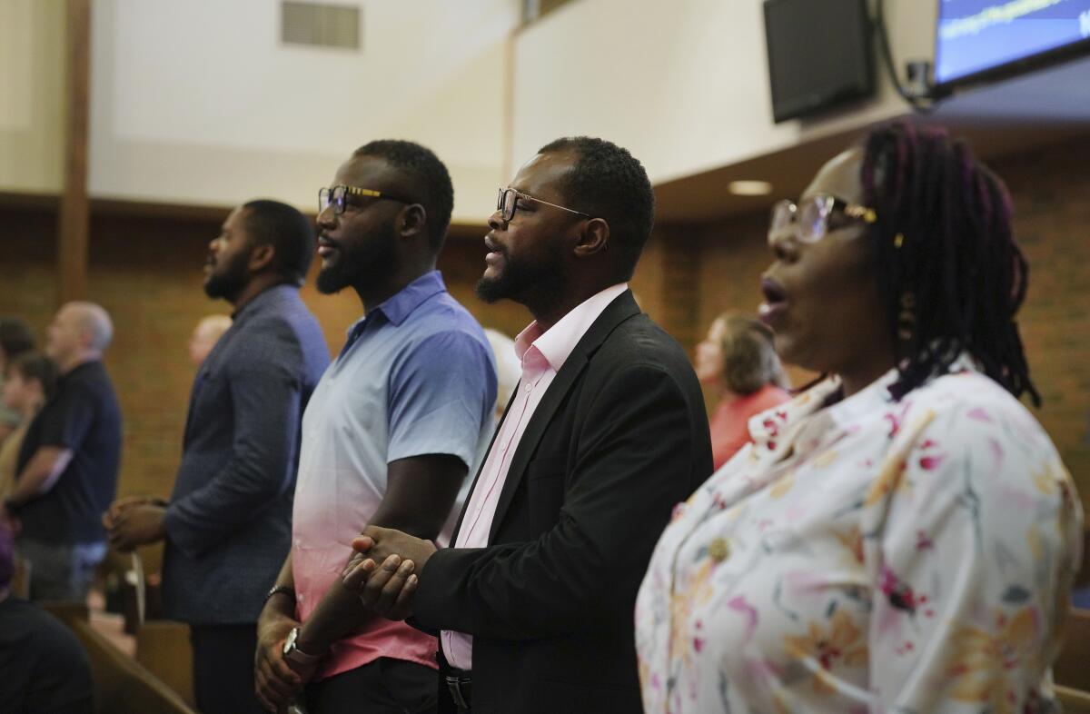 Following a Week of Unfounded Allegations of Pet Food Consumption, Haitians Find Unity at Church